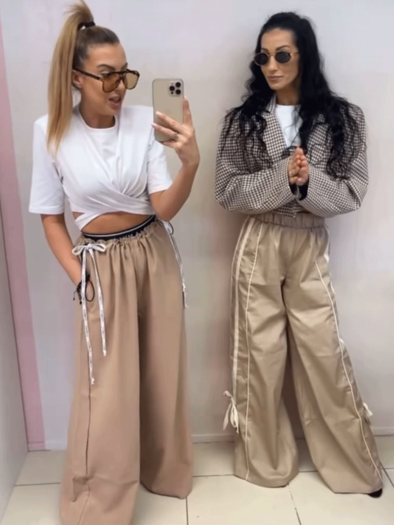 Szerokie spodnie z ściągaczami w...