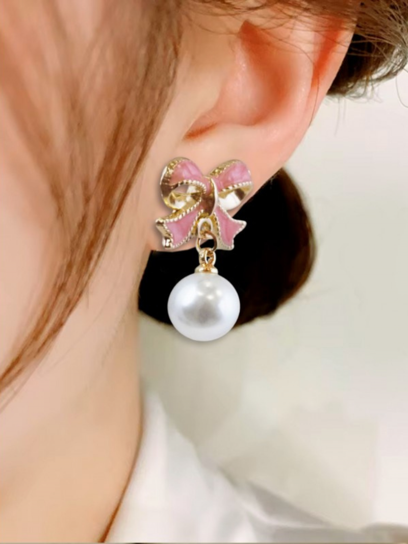 Efektowne perłowe kolczyki z...