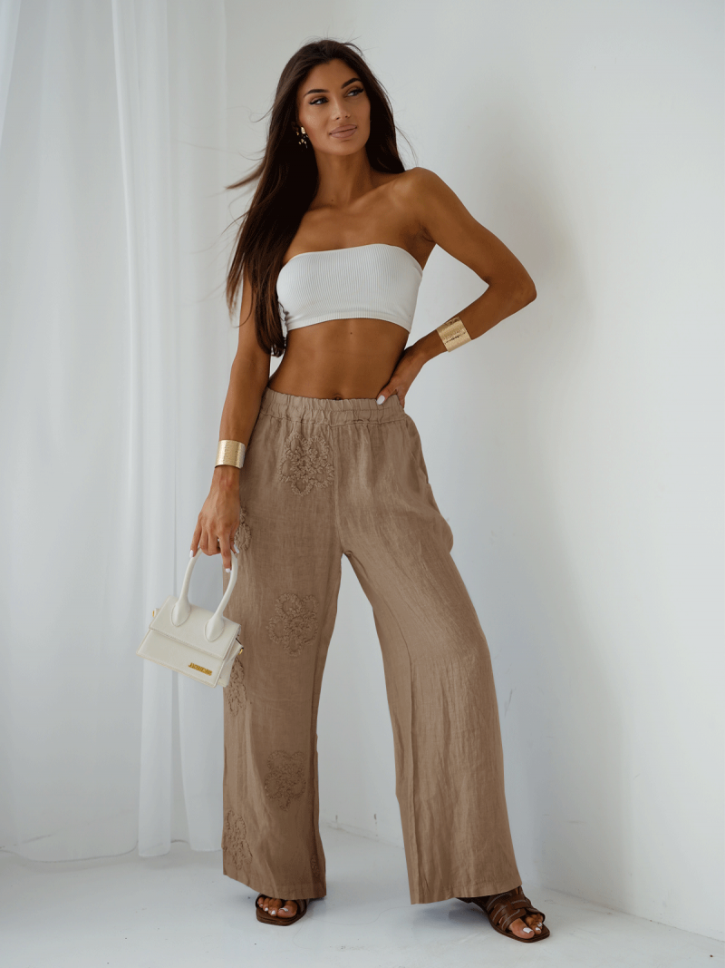 Stylowe lniane spodnie z szerokimi...