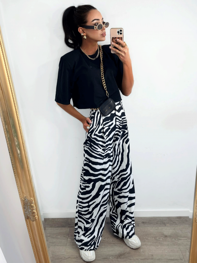 Stylowe spodnie w print MOANI - zebra