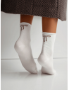 Skarpetki damskie prążkowane bezuciskowe z kokardką - białe