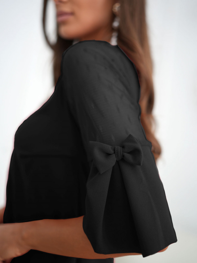 Elegancka sukienka z tiulowymi...